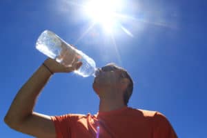 man drinking water