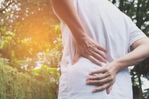 man suffering from backache
