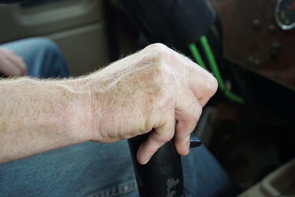 Hand on the gears