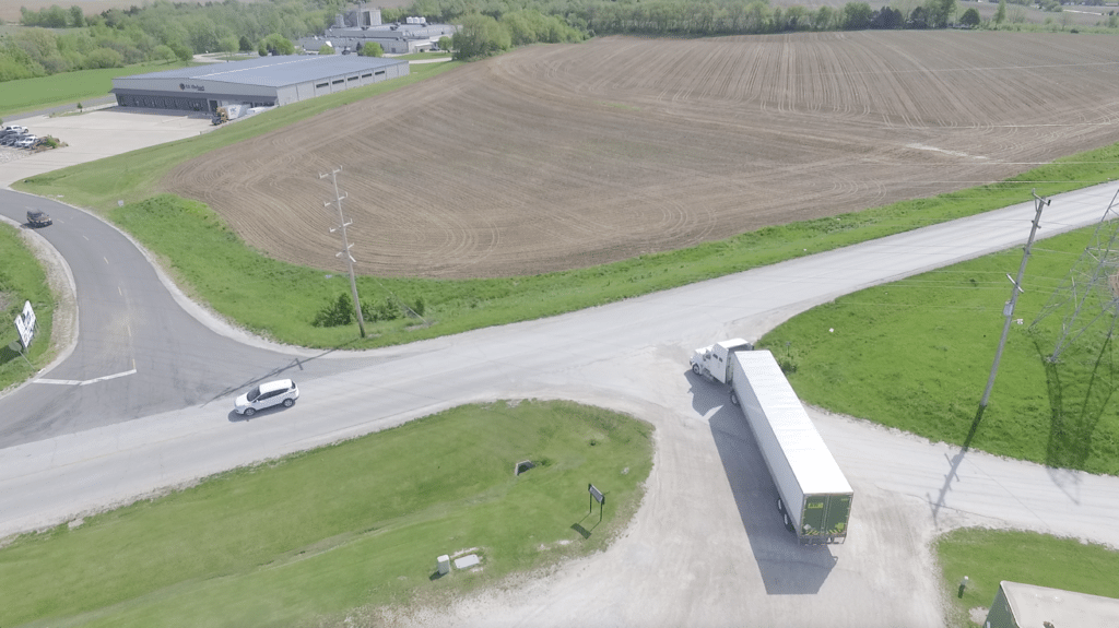 Aerial view of Sisbro truck pulling out of drive