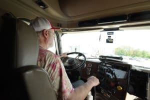Sisbro driver behind the wheel of a truck