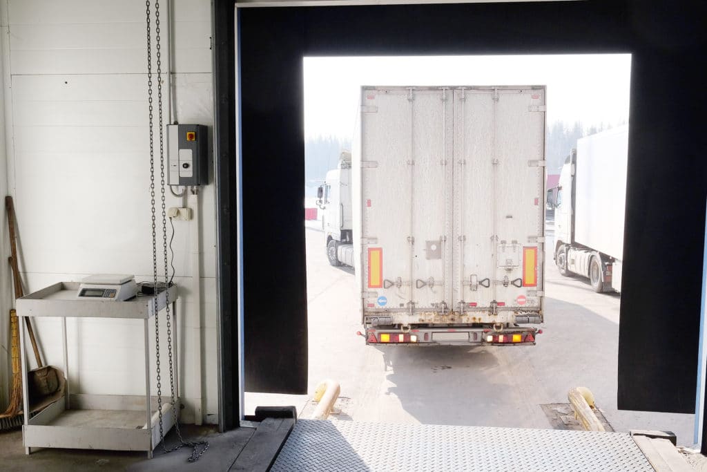 Truck backing into a loading dock