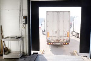 Truck backing into a loading dock