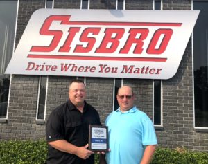 Great West Casualty Company Safety Representative presenting Sisbro Director of Safety Glenn Meyers with 2020 Platinum plaque for National Safety Award
